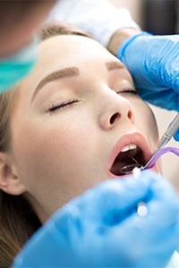Relaxed patient receiving dental treatment