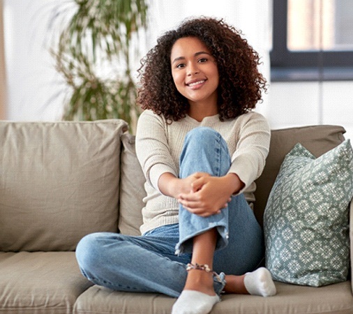 A young woman smiling