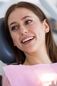 Smiling woman in dental chair