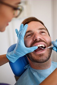 Man receiving dental treatment