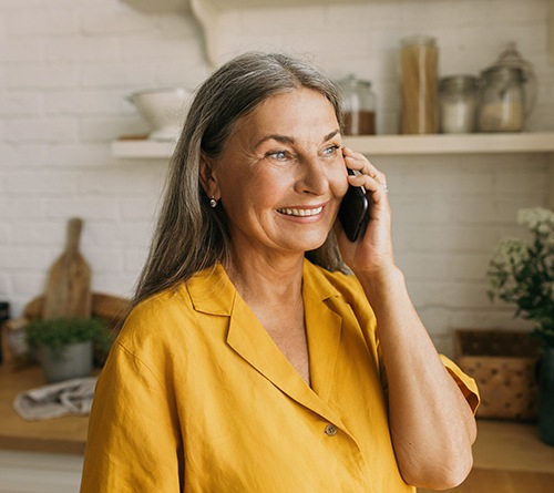 Woman smiling on the phone