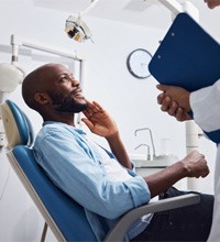 a man speaking with his dentist