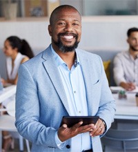 a smiling, confident man