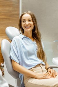 a dentist speaking with a patient