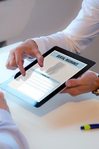 Dental insurance forms on tablet computer