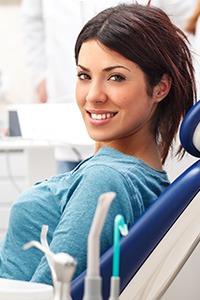 Smiling woman in dental chair