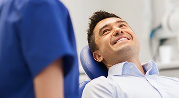 Smiling man in dental chair