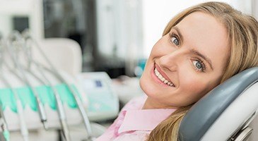 Smiling woman in dental chair