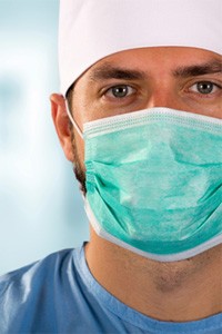 portrait of oral surgeon wearing facemask