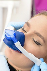 Patient with nitrous oxide nose mask