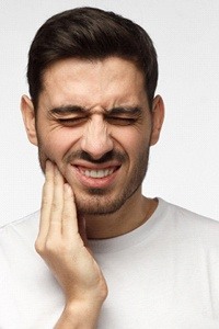 Man with jaw pain