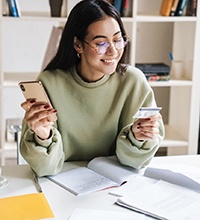 Woman using a credit card