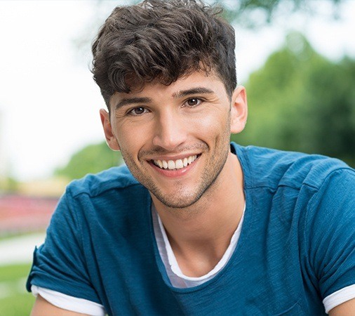 Young man with straight healthy smile