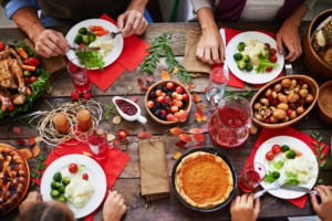 Above view of family eating thanksgiving dinner at table