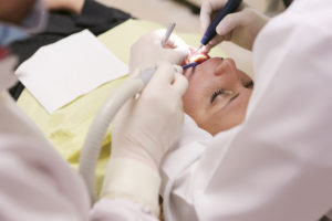 Woman having gum grafting procedure