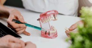 a dentist and patient chatting about dental implants